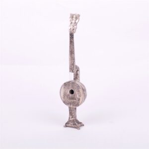 Silver musical instrument. — image 1