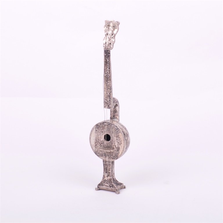 Silver musical instrument. — image 1