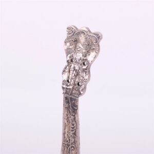 Silver musical instrument. — image 2