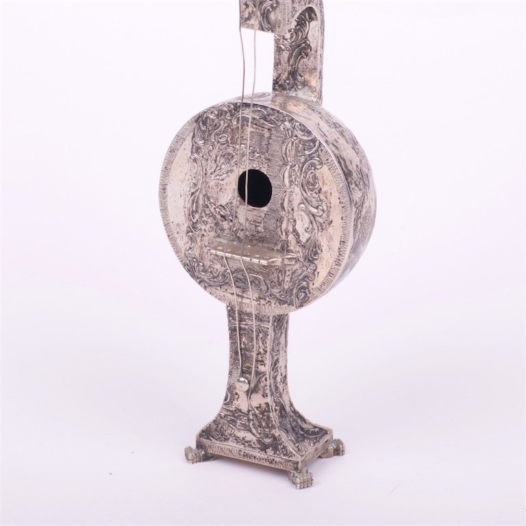 Silver musical instrument. — image 3