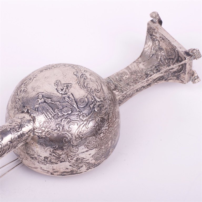 Silver musical instrument. — image 5