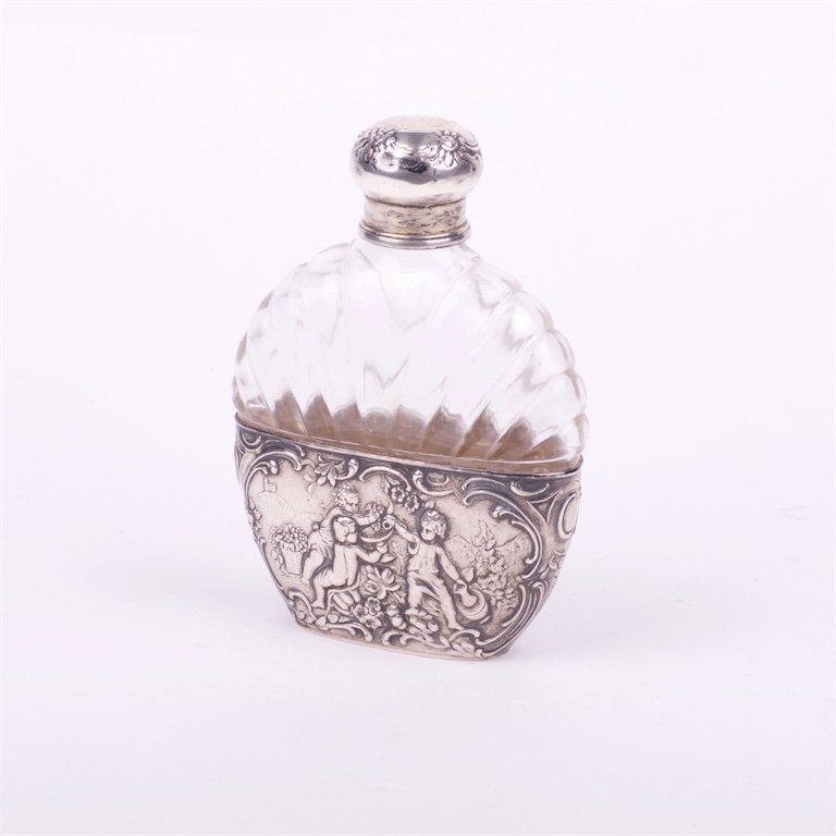 Glass bottle with silver inserts. — image 1