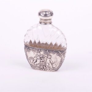Glass bottle with silver inserts. — image 2