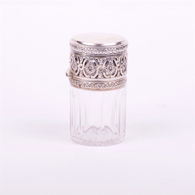 Glass bottle with silver cover. — image 1