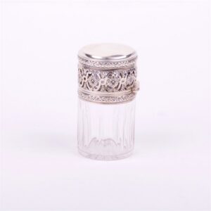 Glass bottle with silver cover. — image 2