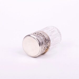 Glass bottle with silver cover. — image 3