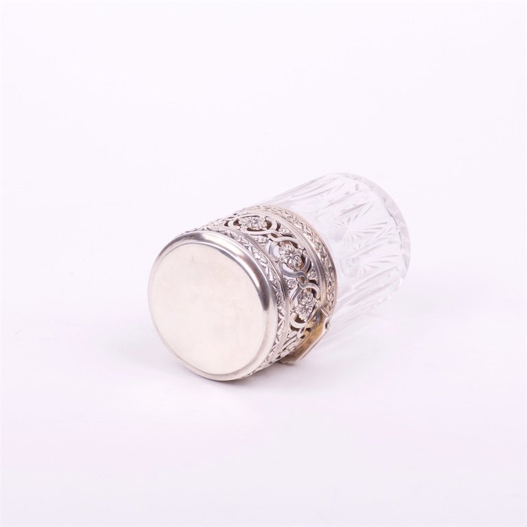 Glass bottle with silver cover. — image 3