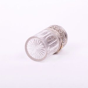 Glass bottle with silver cover. — image 4