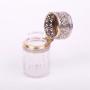Glass bottle with silver cover. — image 5