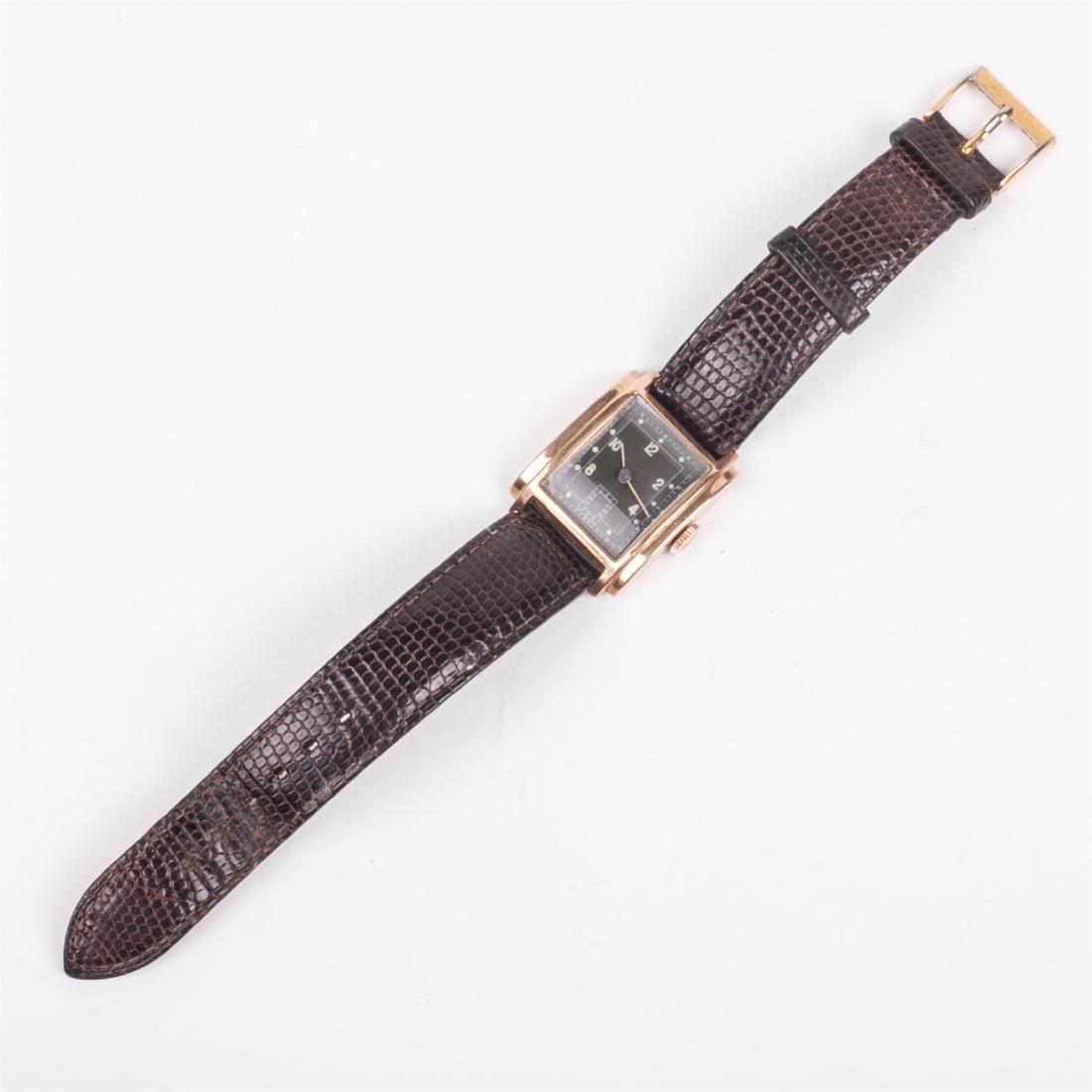 18K gold men's wristwatch on a leather strap — image 2