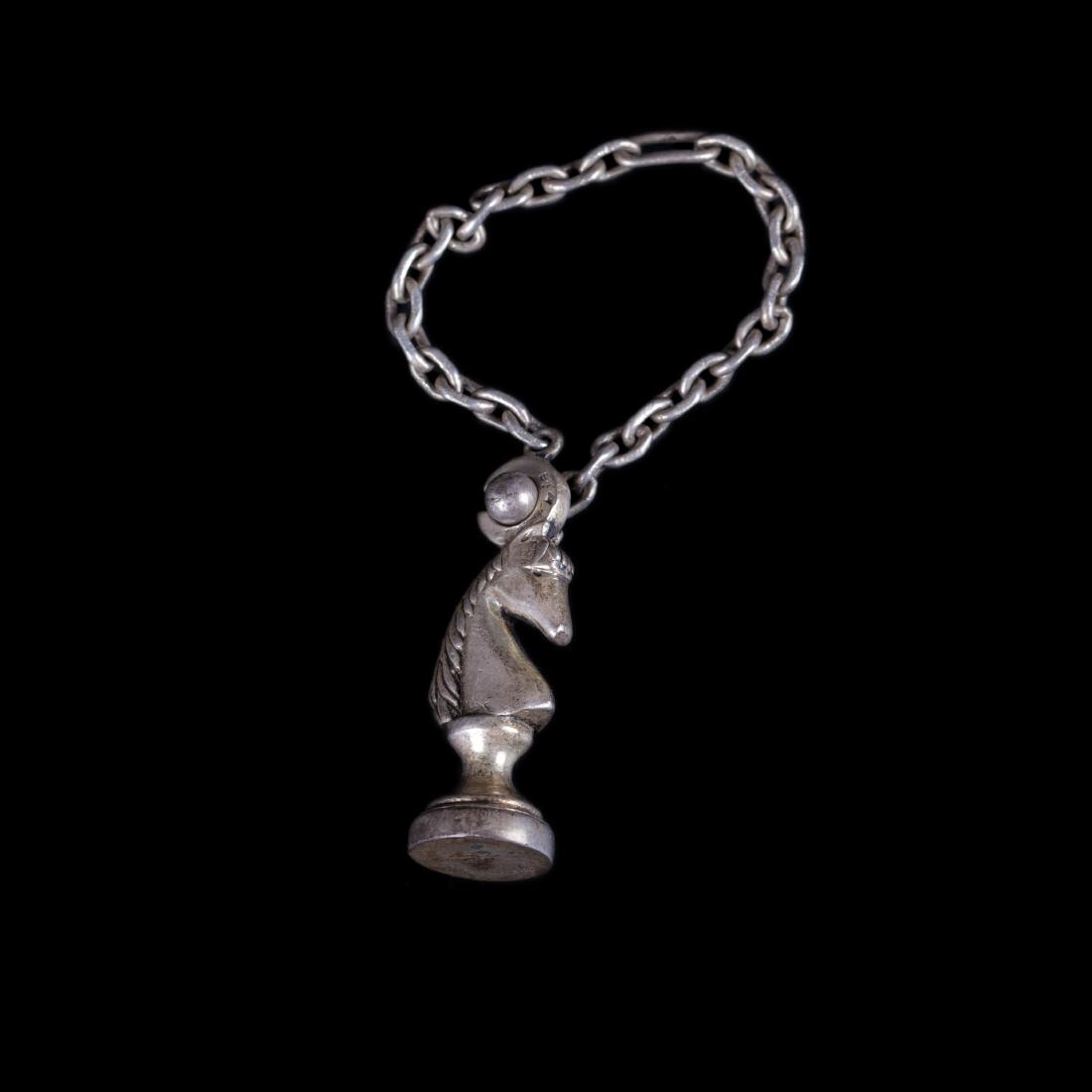 Rare Hermes silver keychain in the shape of chess — image 1