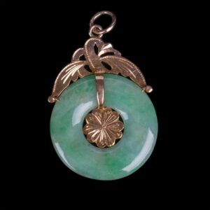 Jade pendant with 9K gold — image 1