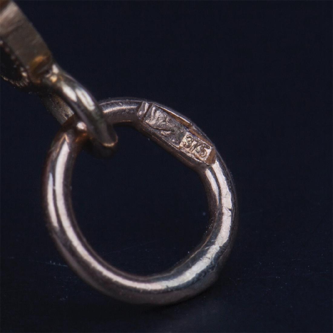 Jade pendant with 9K gold — image 3