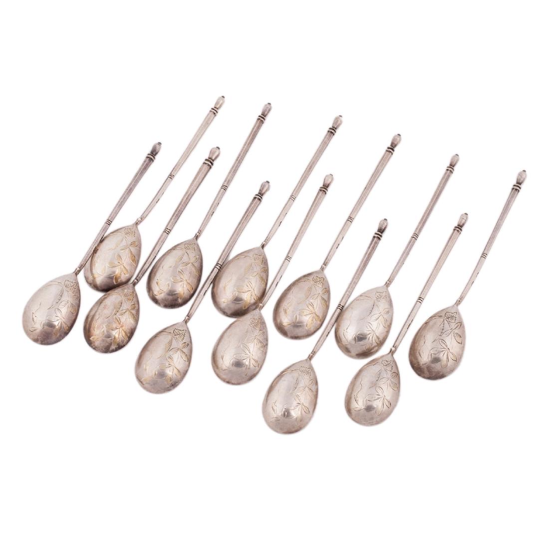 Set of 12 engraved silver tea spoons — image 1