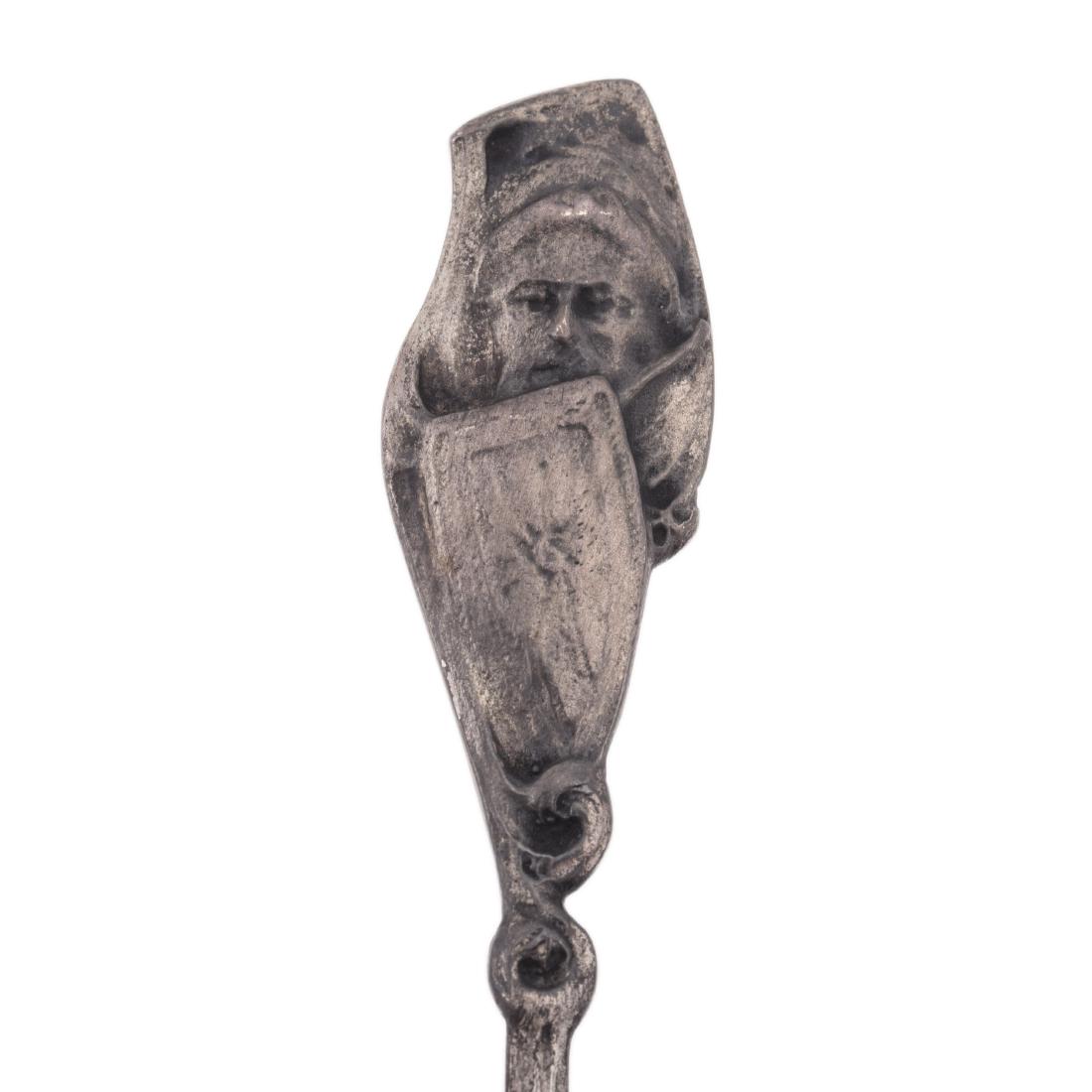 Silver cast tea-holder spoon "Bogatyr zastava" — image 3