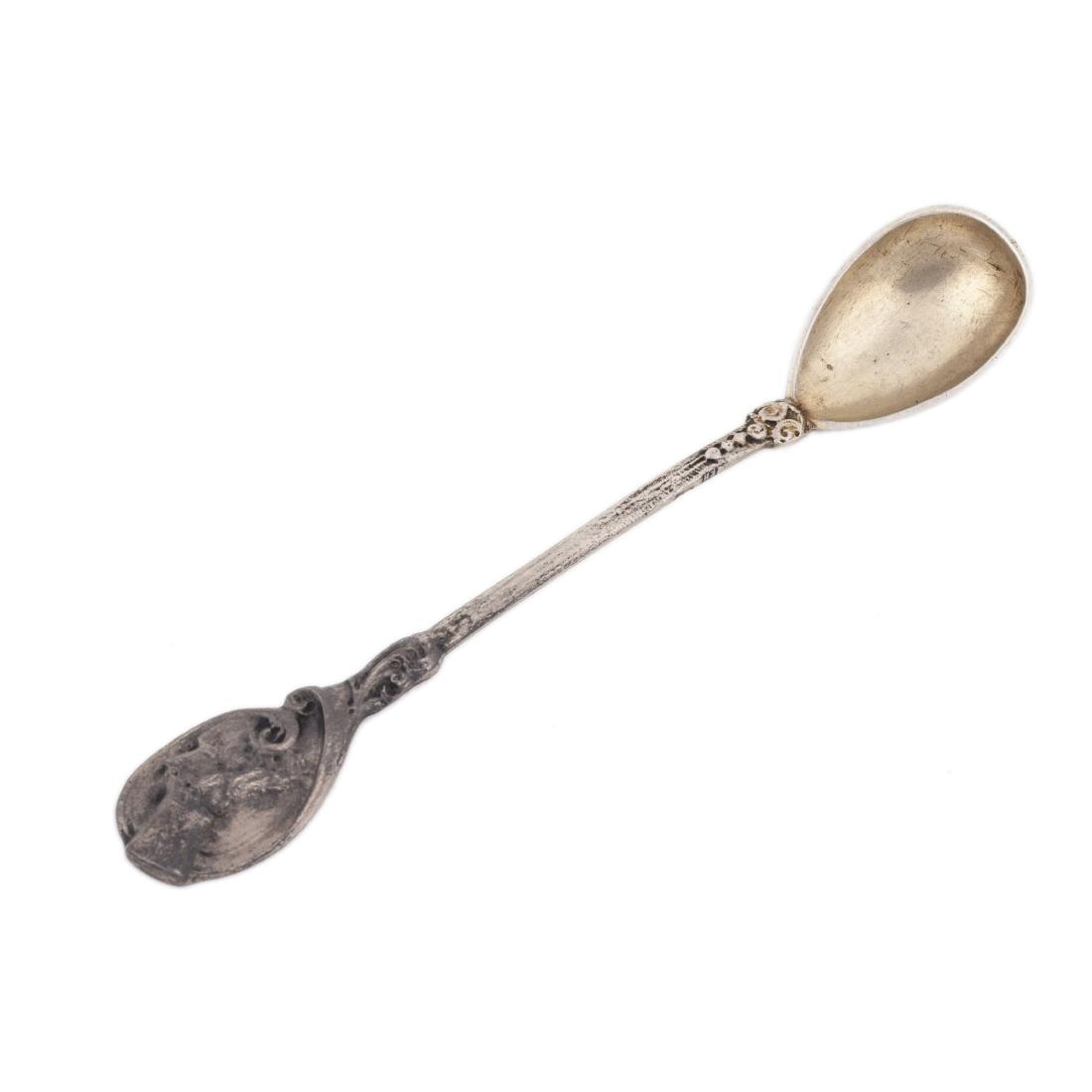 Silver cast tea-holder spoon "Bogatyr zastava" — image 1