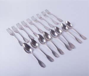 Set of French solid silver spoons and forks. — image 1