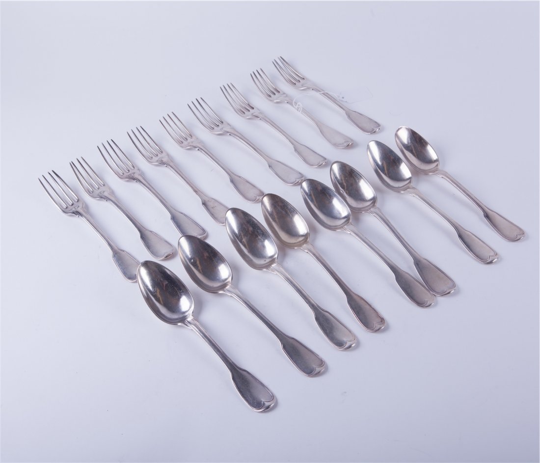 Set of French solid silver spoons and forks. — image 1