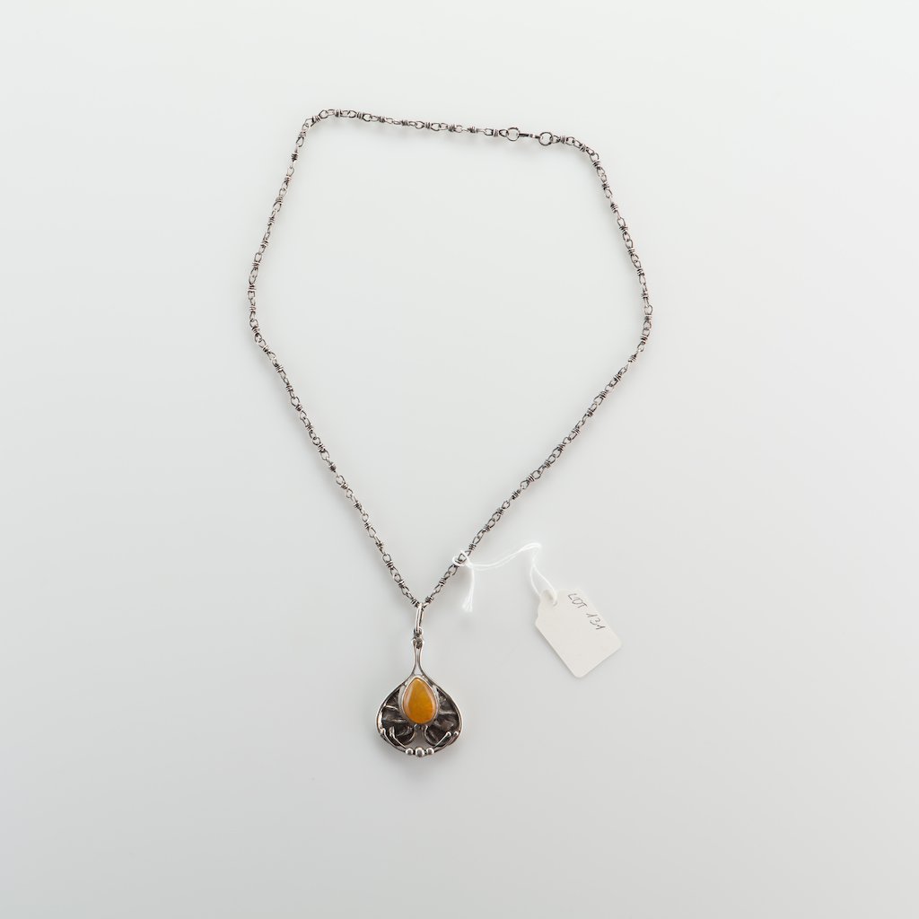 Natural Old Baltic Amber pendant in silver. — image 1