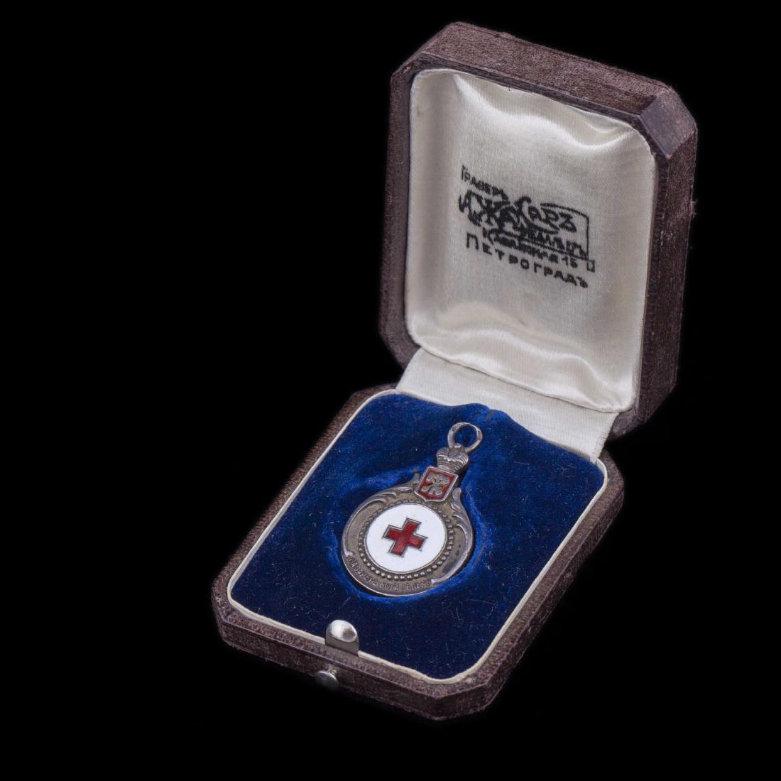 Russian silver and enamel Red cross badge — image 1
