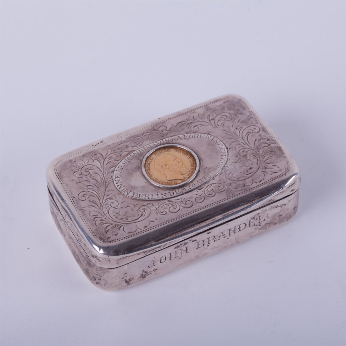 Silver box with gold coin. — image 2
