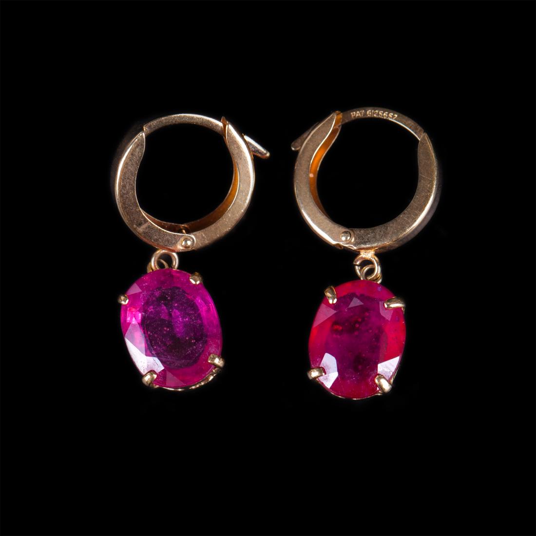 18K gold earrings with rubies — image 1