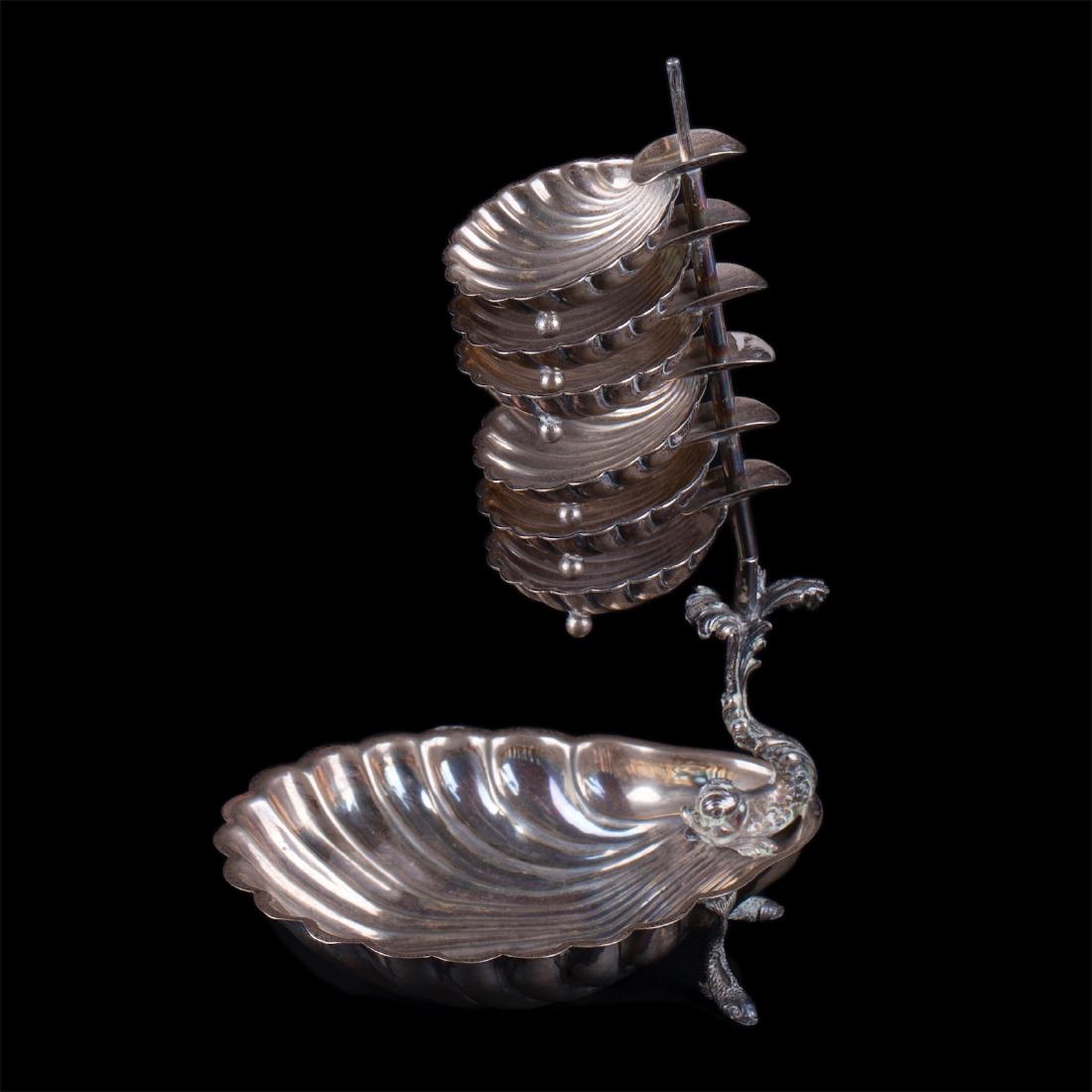 Silver serving set in a shape of shells — image 1