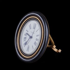 Cartier oval gilt-bronze mechanical desk clock — image 1