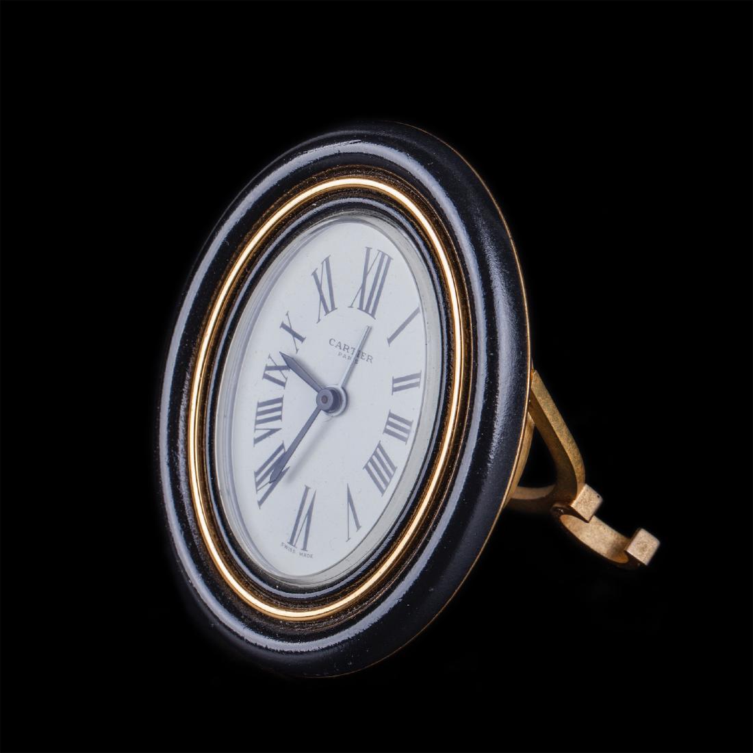 Cartier oval gilt-bronze mechanical desk clock — image 1