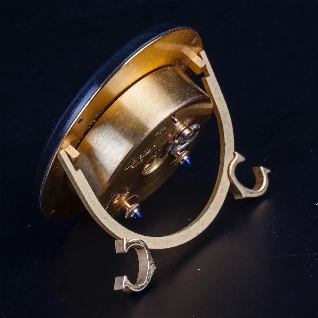 Cartier oval gilt-bronze mechanical desk clock — image 3