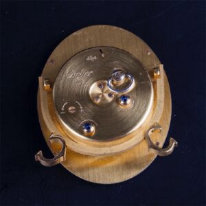 Cartier oval gilt-bronze mechanical desk clock — image 4