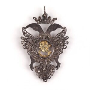 Pendant in the form of a two-headed eagle. — image 1