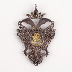 Pendant in the form of a two-headed eagle. — image 2