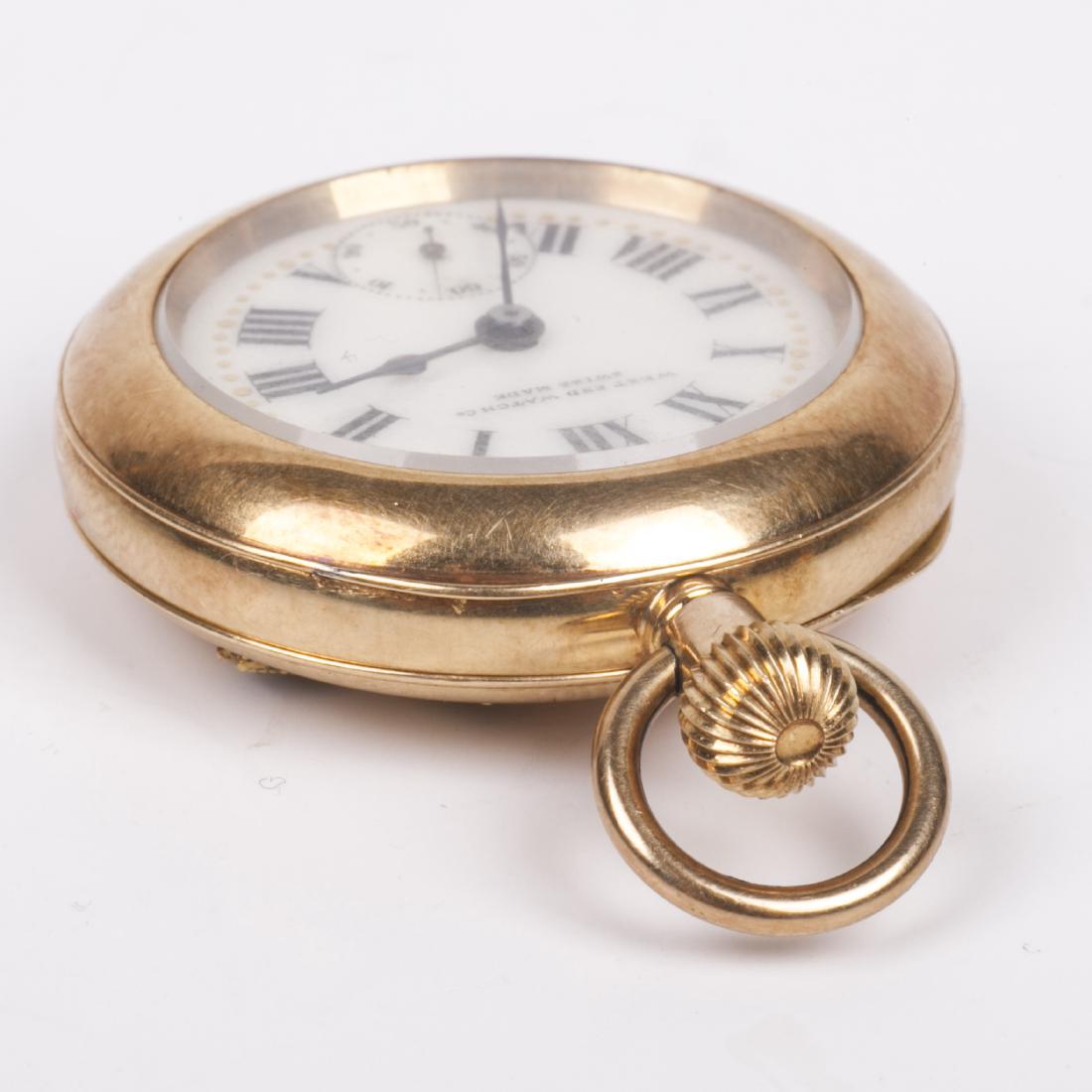 Gold pocket watch with diamonds and emerald stone — image 6