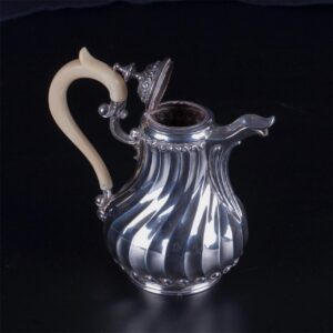 Antique French silver creamer with white material — image 2