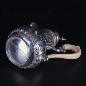 Antique French silver creamer with white material — image 4