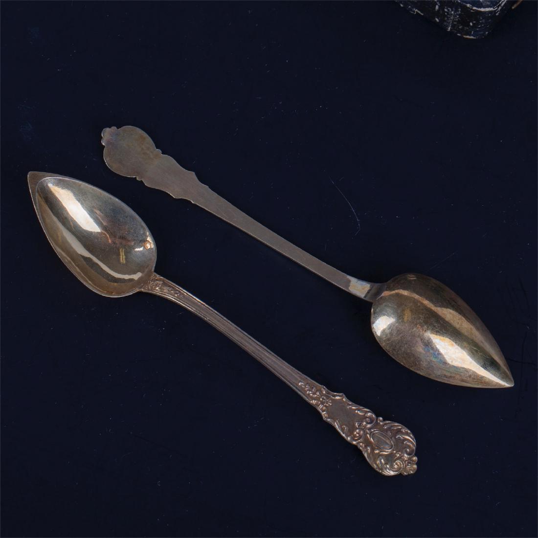 Silver set of 11 tea spoons and sugar tongs — image 2
