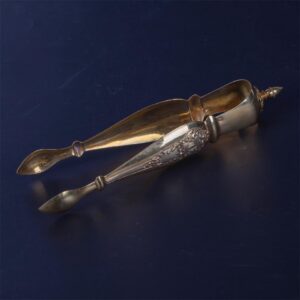 Silver set of 11 tea spoons and sugar tongs — image 3