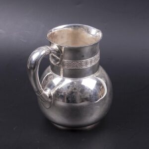 A Tiffany & Co silver water pitcher with wave motif — image 2