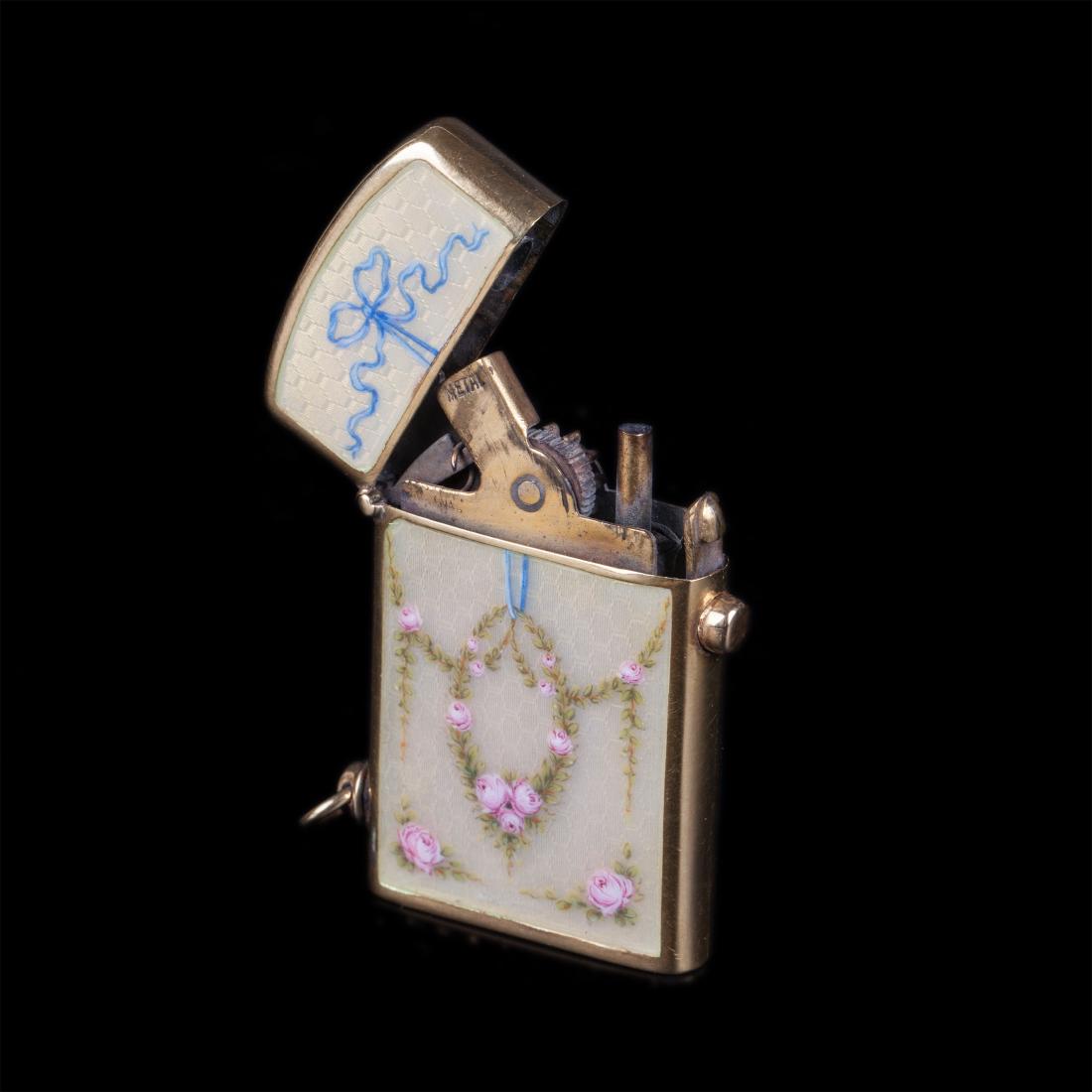 Vintage enamel and yellow metal cigarette lighter — image 1
