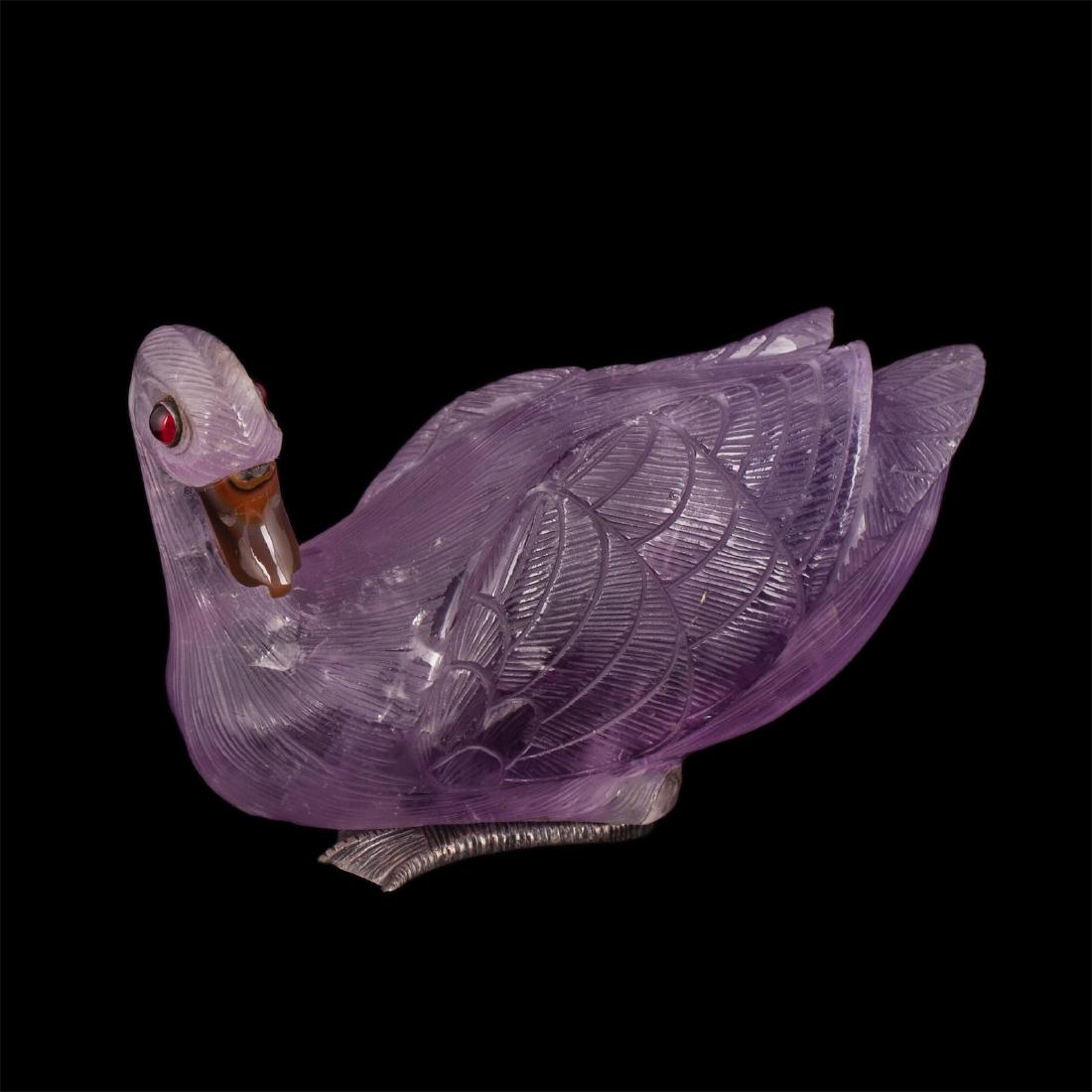 Swan figure made of amethyst with silver legs — image 1