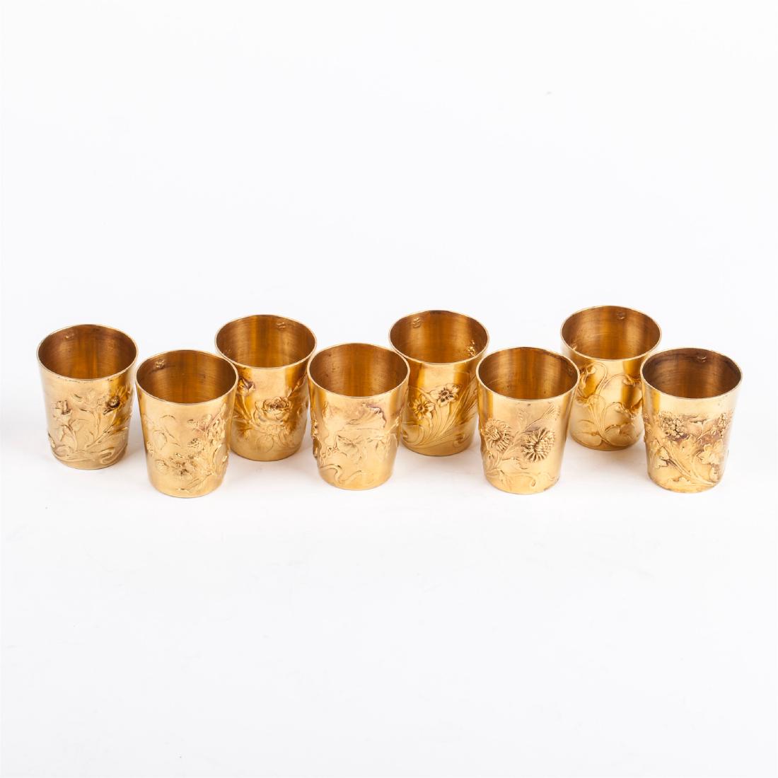 Antique set of 8 Art Nouveau silver gilt beakers — image 2