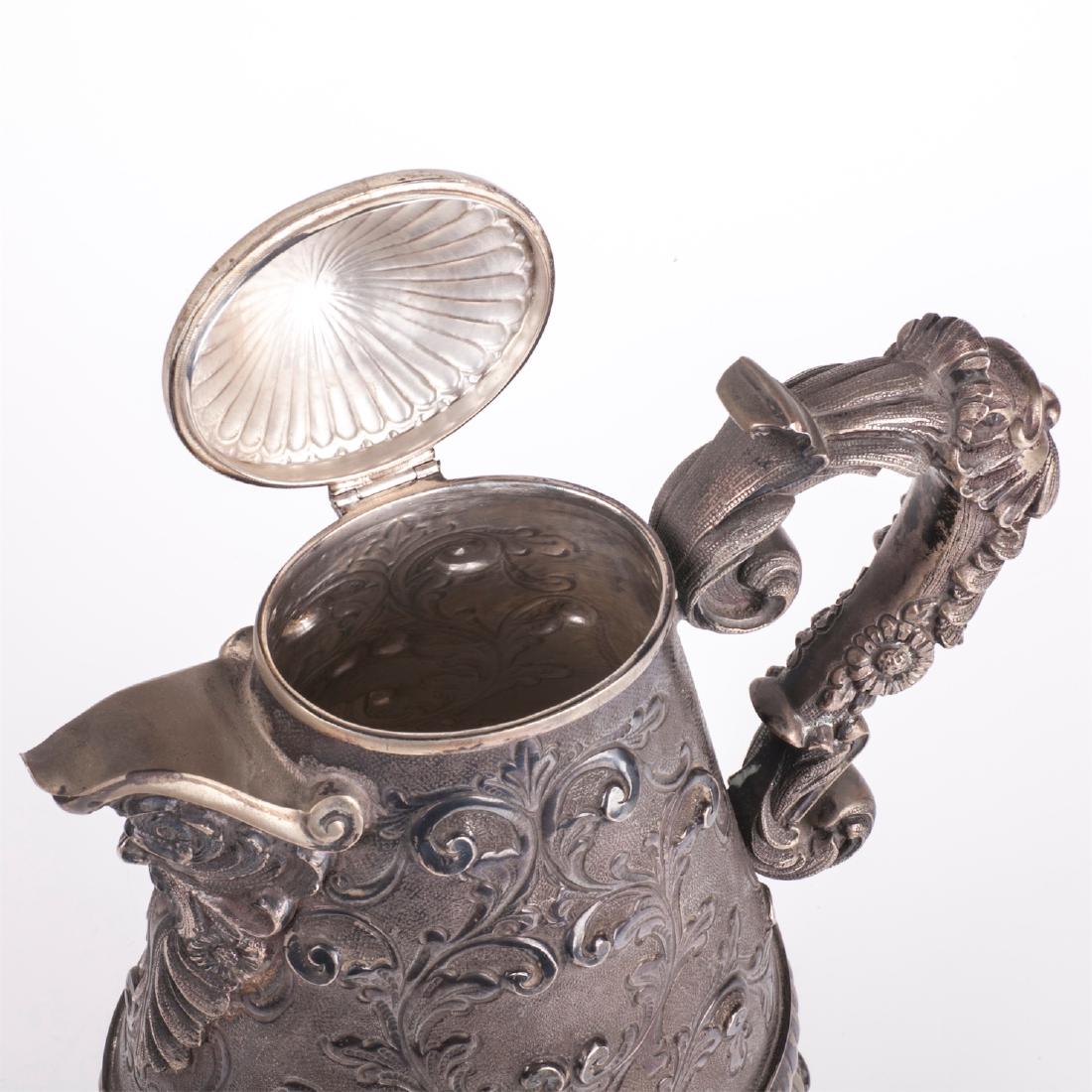 Antique silver water jug on legs — image 6
