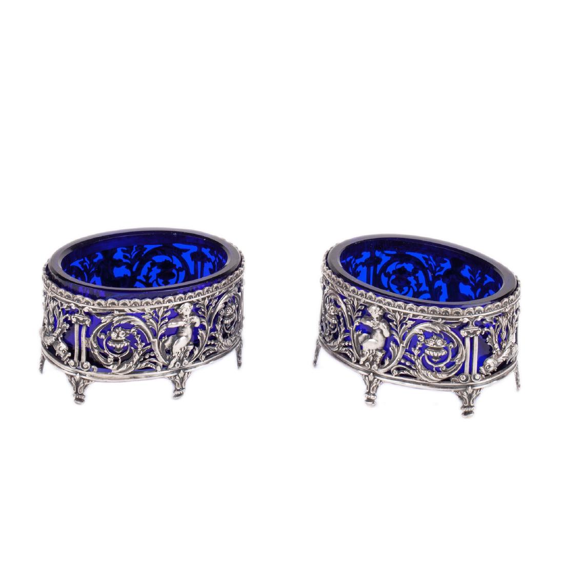 A pair of antique silver mounted blue glass salt — image 1