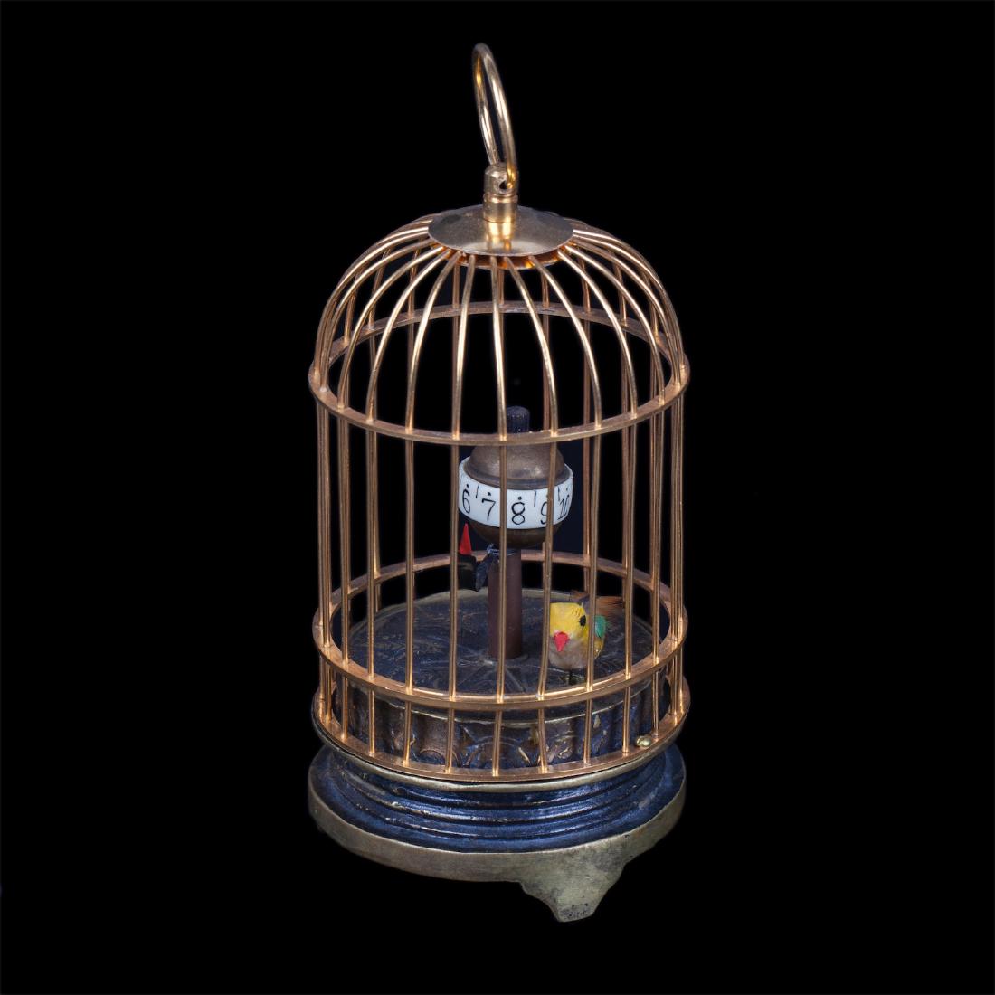 Interesting desk clock in the shape of a bird-cage — image 1