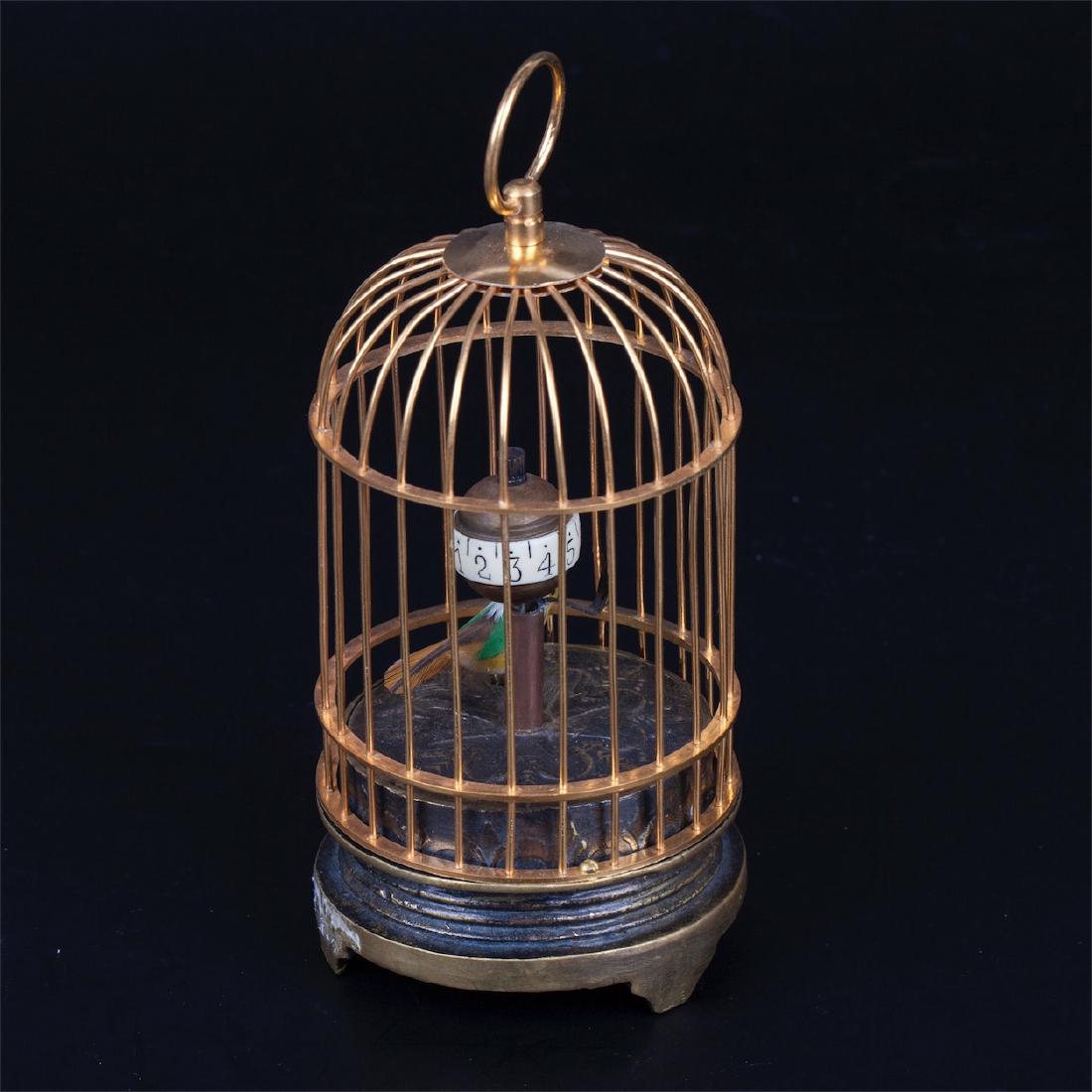 Interesting desk clock in the shape of a bird-cage — image 3