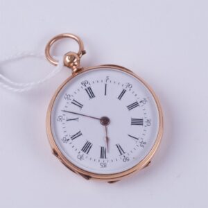 Open face gold pocket watch witch key. — image 1