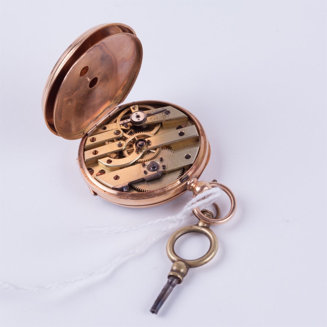 Open face gold pocket watch witch key. — image 7