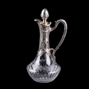 Antique crystal decanter with silver inserts — image 1