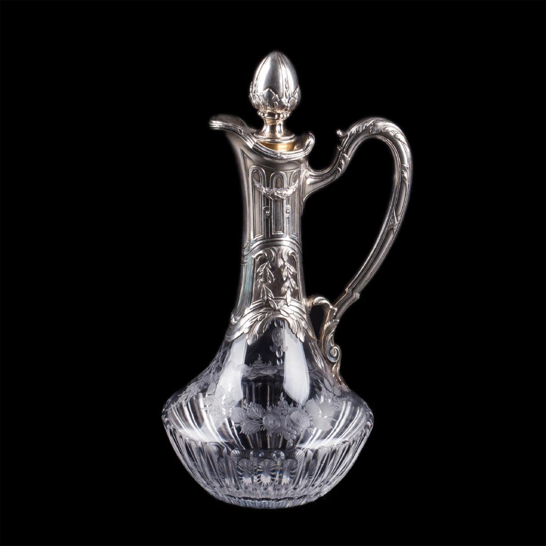 Antique crystal decanter with silver inserts — image 1